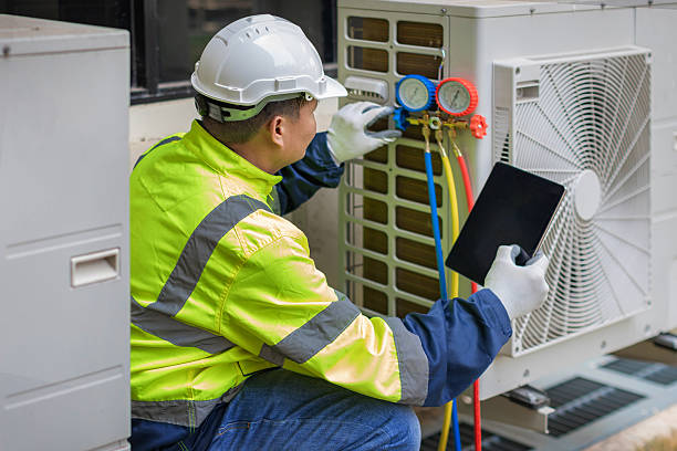 Professional Hvac technician working in Parma, OH